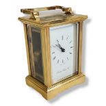 LONDON CLOCK CO., A MID 20TH CENTURY GILDED BRASS CARRIAGE CLOCK White enamel dial, Roman