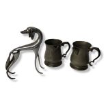 A PAIR OF VICTORIAN PEWTER TANKARDS/JUGS Having a single handle and spout,together with a mid