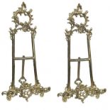 A PAIR OF POLISHED CAST BRASS TABLE PICTURE EASELS In a Baroque/Italian style. (h 55cm) Condition: