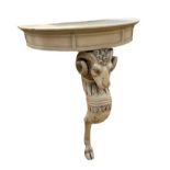 A 19TH CENTURY AND LATER PAINTED PINE DEMILUNE CONSOLE TABLE With single finely carved rams head leg