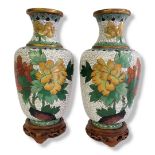 A SMALL PAIR OF 20TH CENTURY CHINESE CLOISONNÉ BALUSTER VASES Inlaid and worked with flora and fauna