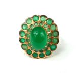 A LARGE 14CT GOLD CHALCEDONY & EMERALD COCKTAIL RING The large chalcedony surrounded by