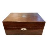 A SEWING BOX WITH HINGED LID Opening to reveal a silk fitted interior. (h 11cm x d 17.5cm x w 25cm)