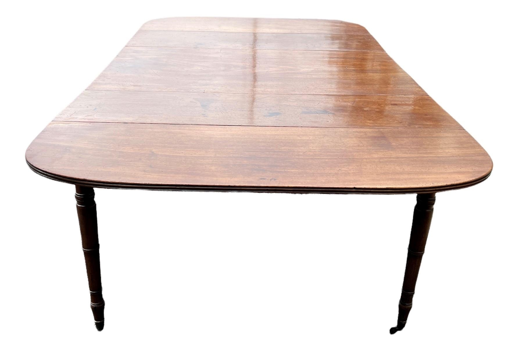 MANNER OF GILLOWS, A 19TH CENTURY SOLID MAHOGANY EXTENDING PEMBROKE DINING TABLE With concertina - Image 5 of 6