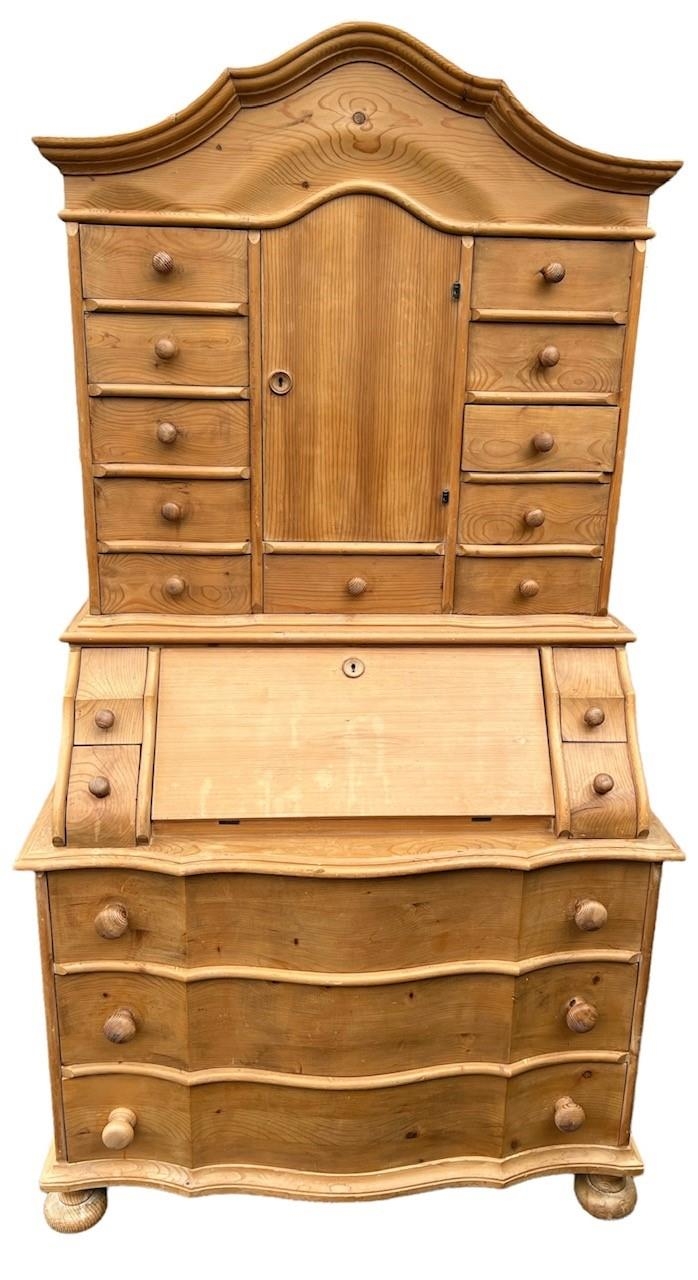 AN 18TH CENTURY DUTCH STYLE STRIPED PINE SERPENTINE FRONT BUREAU CABINET The shaped cornice above