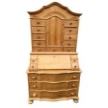 AN 18TH CENTURY DUTCH STYLE STRIPED PINE SERPENTINE FRONT BUREAU CABINET The shaped cornice above