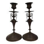 A PAIR OF EARLY 20TH CENTURY CONTINENTAL HEAVY BRASS BRONZED NEOCLASSICAL CANDLESTICKS Each column