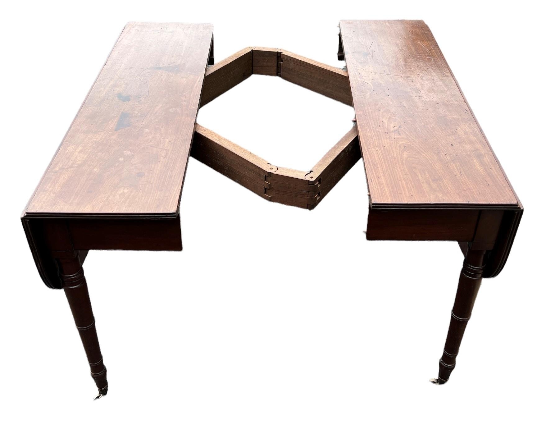 MANNER OF GILLOWS, A 19TH CENTURY SOLID MAHOGANY EXTENDING PEMBROKE DINING TABLE With concertina - Image 6 of 6