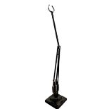 A BLACK HERBERT TERRY ANGLEPOISE LAMP BASE AND STAND.