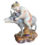 A 19TH CENTURY CAPODIMONTE FIGURE, PUTTI ON A DONKEY Draped with a leopard skin around his lower
