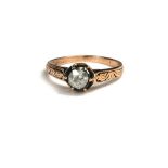 A VINTAGE STYLE 8CT ROSE GOLD DIAMOND SOLITAIRE RING. (diamond approx 0.35ct)