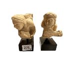 TWO 3RD/4TH CENTURY GANDHARA, HADDA STUCCO HEADS OF MUSICIANS Holding a drum and the other holding a