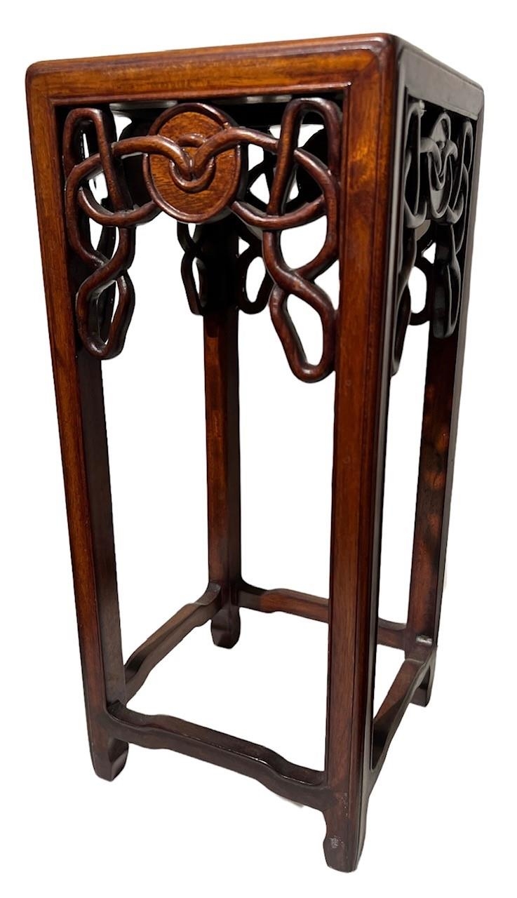 A SMALL CHINESE HARDWOOD TABLE STAND The square top above a pieced frieze, raised on square - Image 5 of 5