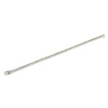 A PLATINUM AND ROUND BRILLIANT CUT DIAMOND TENNIS BRACELET Boxed. (diamonds 5.05ct)