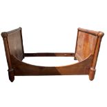 A 19TH CENTURY FRENCH EMPIRE FRUITWOOD DOUBLE SLEIGH BED. (h 116cm x w 138cm x length 202cm)