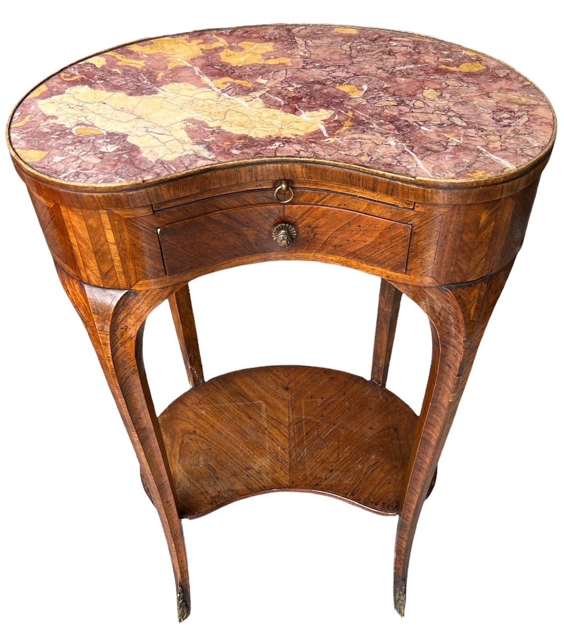 AN 18TH CENTURY FRENCH KIDNEY SHAPED SIDE TABLE The rouge inset top above slide and drawers, on