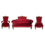 A 19TH CENTURY VICTORIAN CARVED WALNUT THREE PIECE SUITE To include a settee and two chairs. (h 98cm
