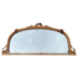 A 19TH CENTURY VICTORIAN WALNUT OVERMANTLE MIRROR With original mercury plate glass and carved