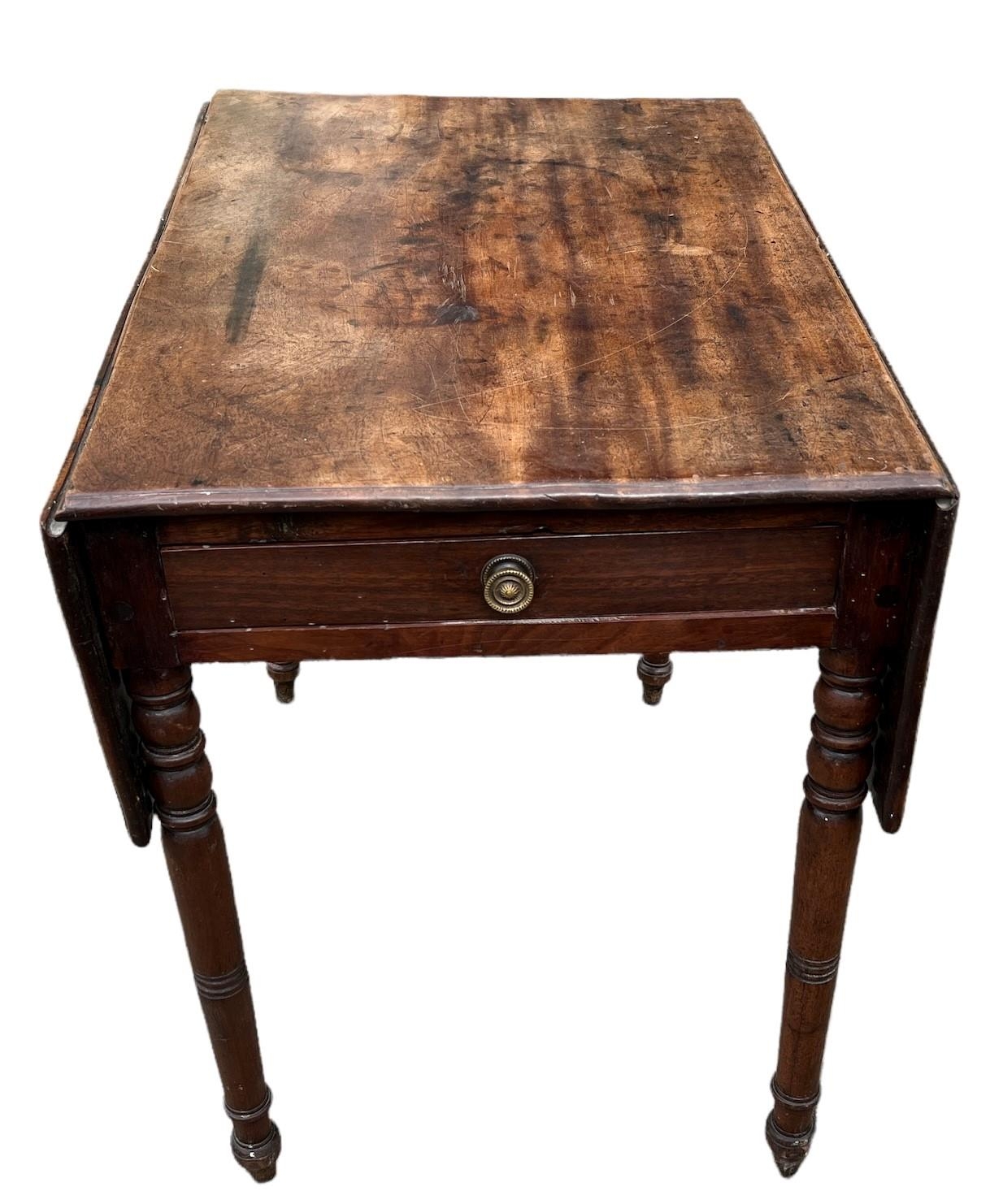 A 19TH CENTURY SOLID MAHOGANY PEMBROKE TABLE With a single drawer, raised on turned legs. (h 72cm