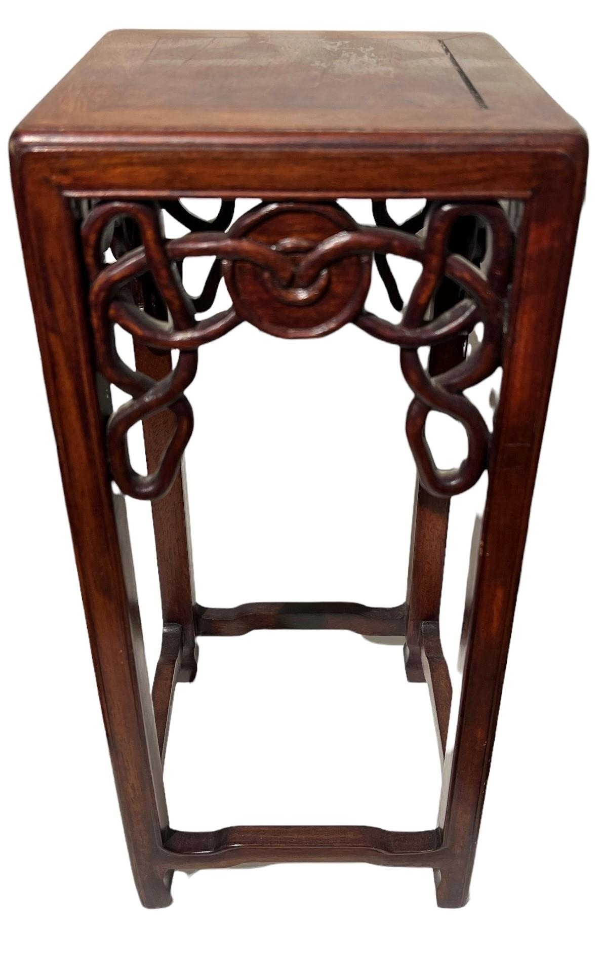 A SMALL CHINESE HARDWOOD TABLE STAND The square top above a pieced frieze, raised on square - Image 2 of 5