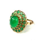 A LARGE 14CT GOLD CHALCEDONY & EMERALD COCKTAIL RING The large chalcedony surrounded by a