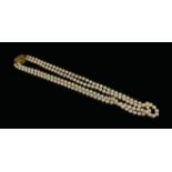 ELIZABETH GAGE, A LARGE DOUBLE STRAND PEARL NECKLACE HAVING 18CT YELLOW GOLD CLASP Marked ‘Gage’