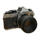 A NIKON FM2 SLR 35MM FILM CAMERA AND 50MM LENS 1:1.BD, N 8422176.