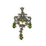 A CHANDELIER STYLE PENDANT set with seed pearls, diamonds, round peridot and pear shaped suspended