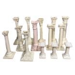 A COLLECTION OF FOURTEEN 19TH CENTURY AND LATER CREAMWARE COLUMN CANDLESTICKS To include examples