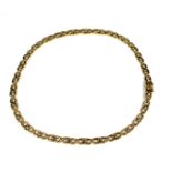 A 9CT GOLD CARTIER STYLE NECKLACE. (length 34cm, 22.5g)