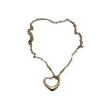 TIFFANY & CO., A STERLING SILVER HEART PENDANT BY ELSA PERETTI, TOGETHER WITH A SILVER CHAIN