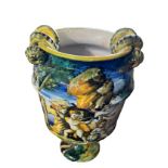 A LATE 19TH/EARLY 20TH CENTURY ITALIAN MAJOLICA CANTAGALLI TWIN HANDLED ISTORIATO MANNER WAISTED