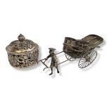 A 19TH CENTURY CHINESE SILVER FIGURAL CRUET MODELLED AS A MANDARIN WITH HAND CART Bearing maker’s