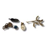 A VINTAGE 9CT GOLD AND PEARL BROOCH Having an arrangement of three pearls in an organic design,