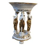 A LARGE CONTINENTAL NEOCLASSICAL STYLE CREAM CERAMIC AND GILDED FIGURAL CENTREPIECE, FOUR GRECIAN