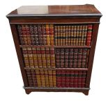 A REPRODUCTION MAHOGANY SIDE CABINET With two doors set with Leather book spines. (83cm x 52cm x