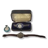 AN EARLY 20TH CENTURY SILVER AND ENAMEL LADIES’ WRISTWATCH Oval case with lilac enamel bezel on