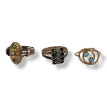 A COLLECTION OF THREE VINTAGE YELLOW METAL AND TURQUOISE RINGS To include a ring with two cabochon