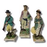 AN EARLY 19TH CENTURY STAFFORDSHIRE PEARLWARE MODEL OF A GARDENER