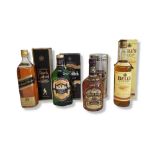A COLLECTION OF FOUR VINTAGE SCOTCH WHISKY BOTTLES To include Johnnie Walker Black label bottle,