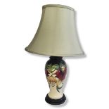 MOORCROFT, A MODERN POTTERY TABLE LAMP BASE, CIRCA 1990 Tubelined decoration with exotic flowerheads