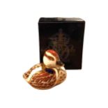 ROYAL CROWN DERBY GOLD, A BUTTONED SWIMMING DUCKLING In original box. (h 6cm x w 7.5cm x depth 5.