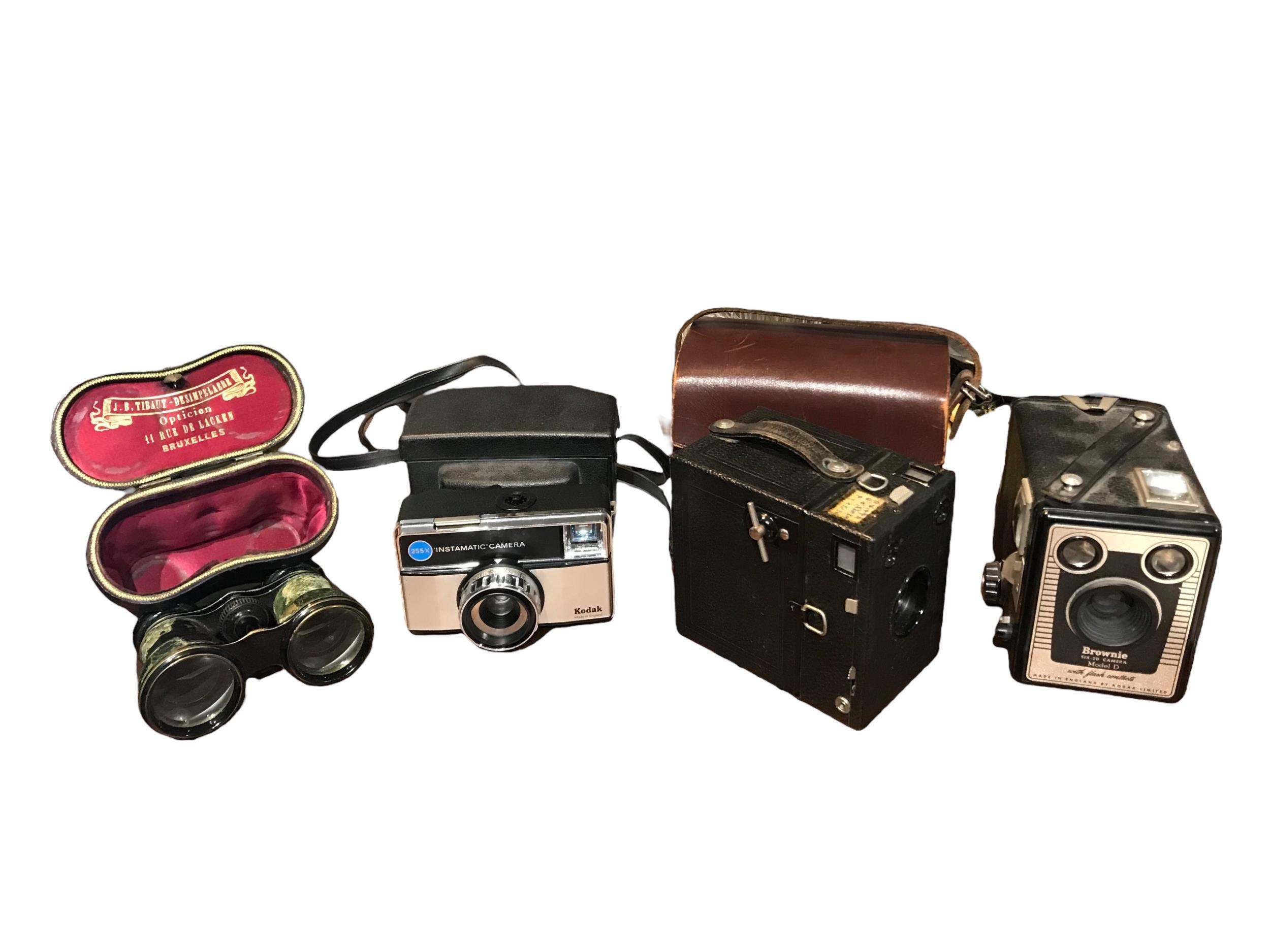 KODAK AND ZEISS, THREE CAMERAS Together with a pair of cased opera glasses, Kodak Brownie six-20