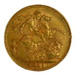 AN EARLY 20TH CENTURY 22CT GOLD SOVEREIGN COIN, DATED 1911 With King George V bust and George and