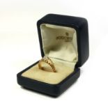 A VINTAGE YELLOW METAL AND DIAMOND GENTS SIGNET RING The single round old cut diamond in rope