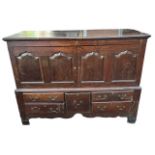 A LARGE 18TH CENTURY OAK MULE CHEST With panel doors above drawers (now converted). H111 x W146 x