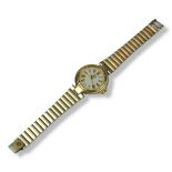 DUNHILL, A STAINLESS STEEL LADIES’ WRISTWATCH The circular white dial with gilt number markings,