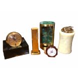 DUNHILL, A GOLD PLATED TALLBOY LIGHTER AND RONSON TABLE LIGHTER Together three desk clocks, two