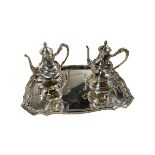 A LARGE 20TH CENTURY EGYPTIAN GEORGIAN DESIGN SOLID SILVER TEASET AND TRAY Comprising two teapots,