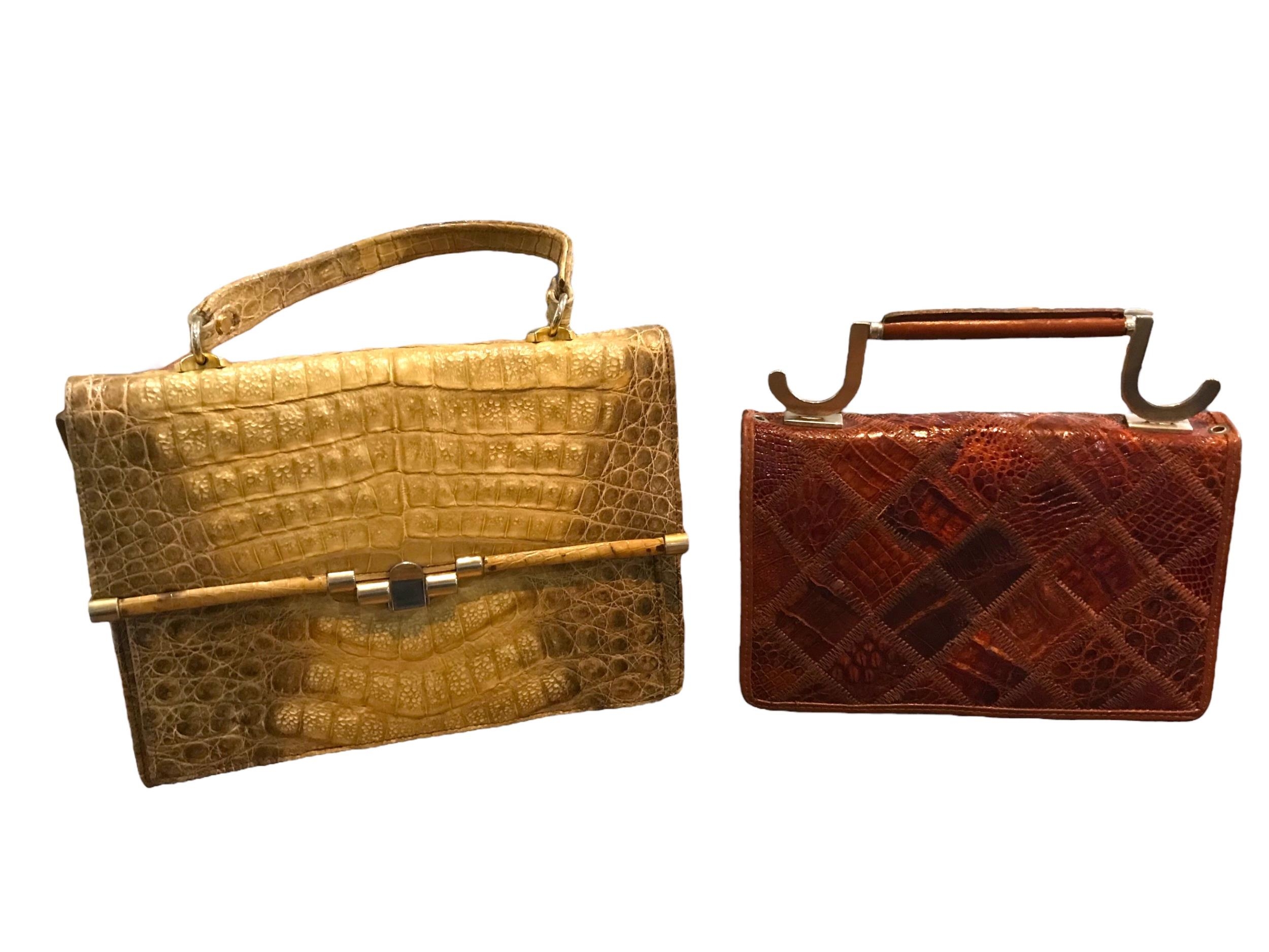 TWO VINTAGE CROCODILE SKIN HANDBAGS. (largest h 32.5cm x w 28.5cm x depth 9.5cm)